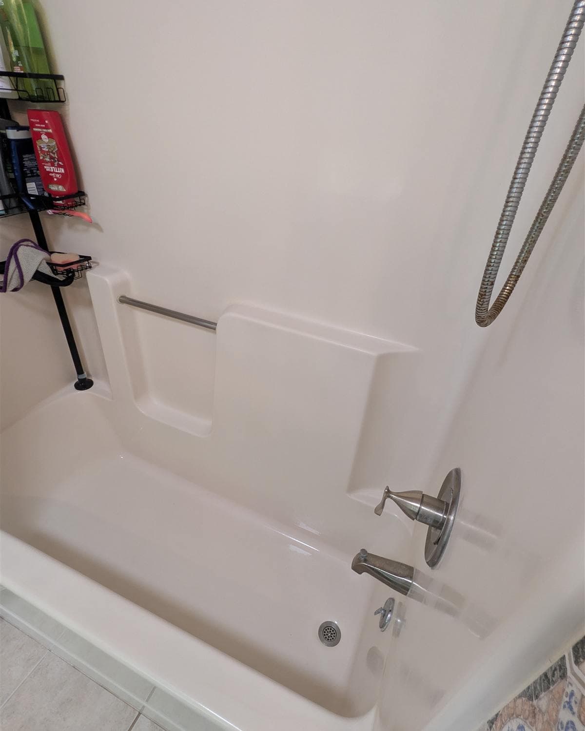Freshly cleaned bathtub and shower surround with polished fixtures in a Stanhope, NJ home