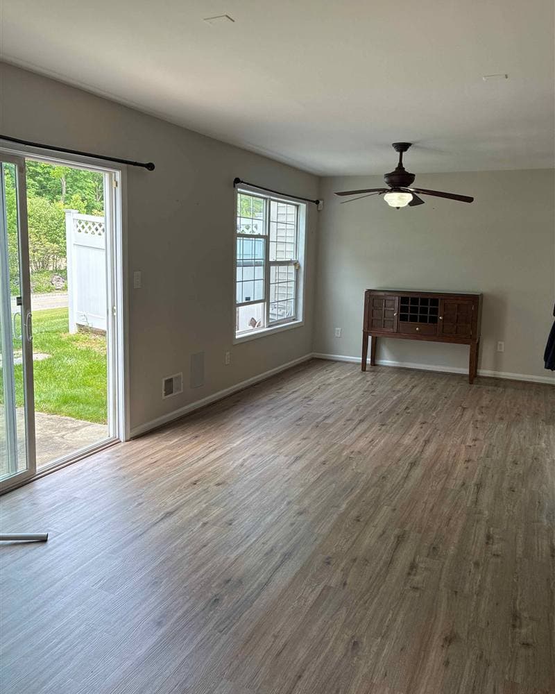Bright, freshly cleaned living room with hardwood floors in Hamburg, NJ